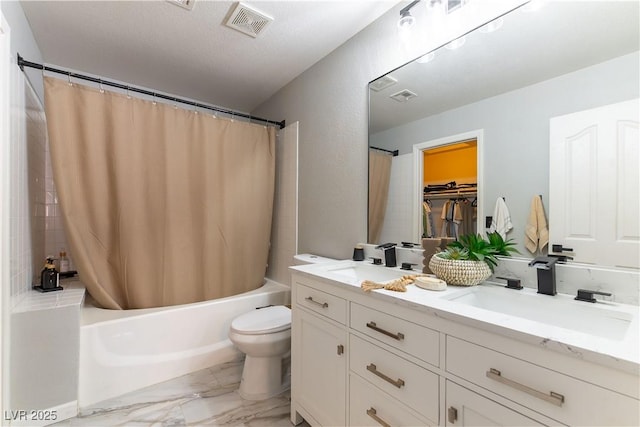 full bath featuring shower / bathtub combination with curtain, double vanity, toilet, and marble look tile flooring