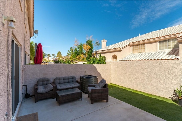 view of patio featuring a fenced backyard and central air condition unit
