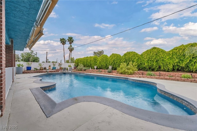view of pool featuring a patio area and fence
