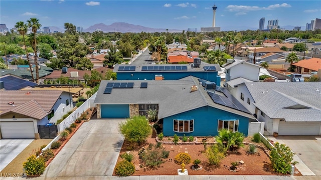 aerial view of residential area with mountains