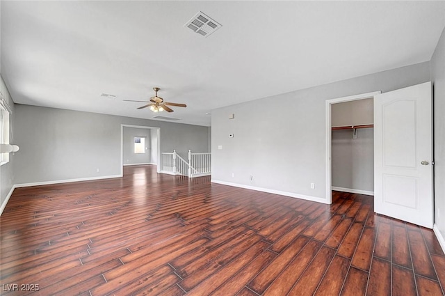 10135 Diving Duck Ave, Las Vegas, NV 89117 - unfurnished living room with wood finished floors, ceiling fan, and baseboards