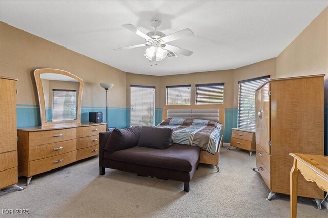 8723 Melissa Meadows St, Las Vegas, NV 89131 - bedroom with multiple windows, light carpet, and a ceiling fan