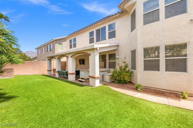 8723 Melissa Meadows St, Las Vegas, NV 89131 - back of property with stucco siding and a patio