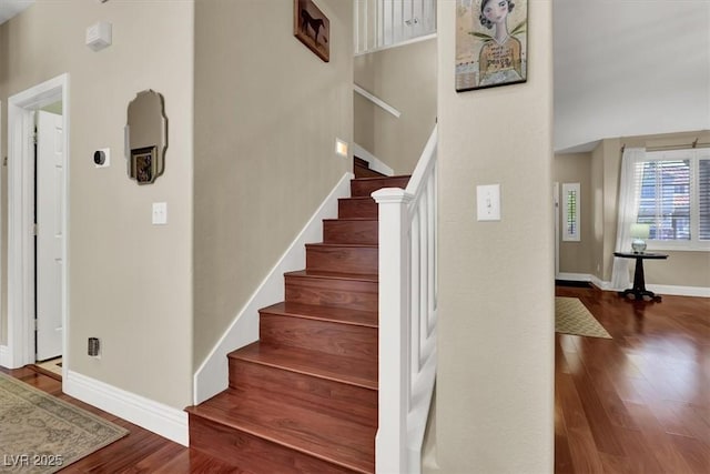10046 Floragold Ct, Las Vegas, NV 89147 - stairway with wood finished floors and baseboards