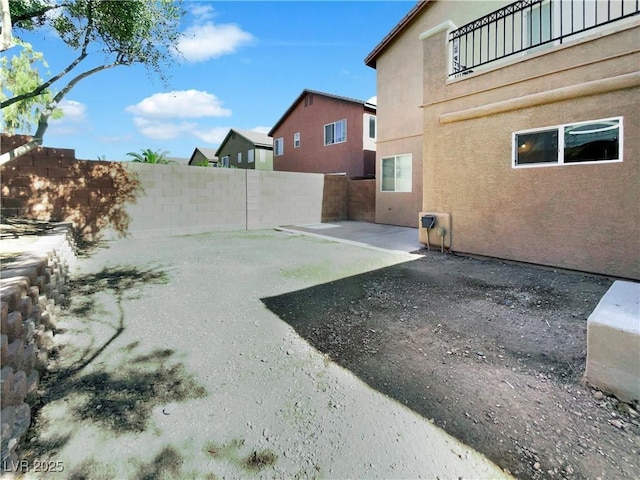10056 Cranbrook Falls Ct, Las Vegas, NV 89148 - fenced backyard featuring a patio area