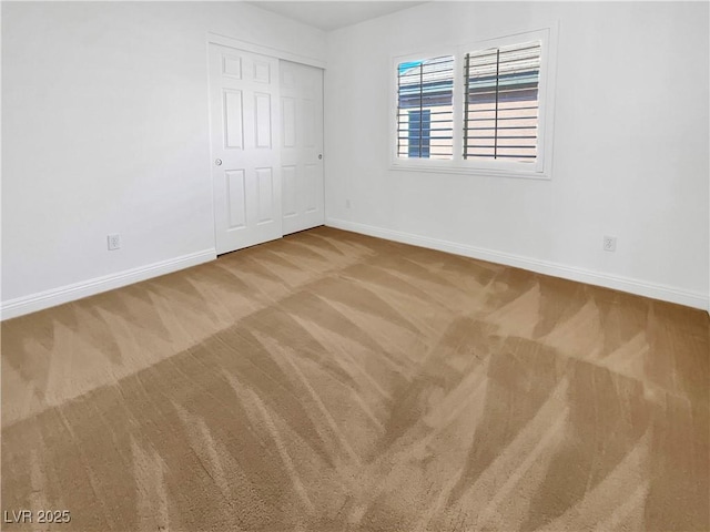 10056 Cranbrook Falls Ct, Las Vegas, NV 89148 - unfurnished bedroom featuring carpet flooring, baseboards, and a closet