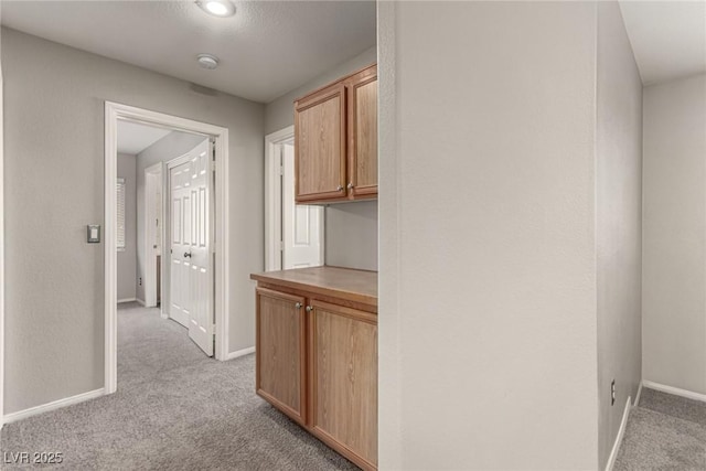 4705 Delicate Arch Ct, North Las Vegas, NV 89031 - hall featuring light colored carpet and baseboards