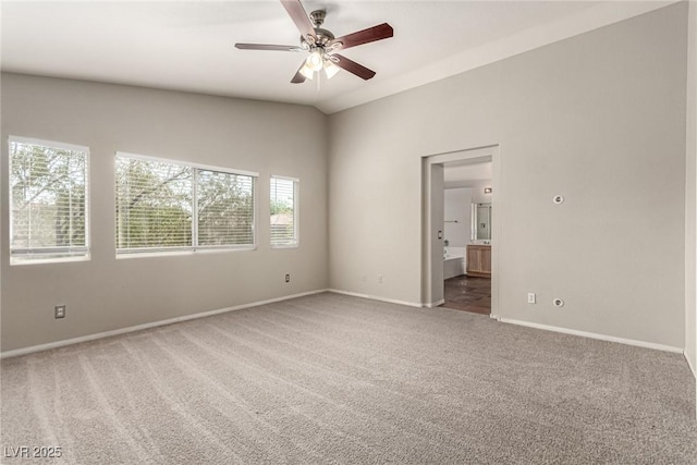 4705 Delicate Arch Ct, North Las Vegas, NV 89031 - empty room featuring carpet, lofted ceiling, baseboards, and ceiling fan