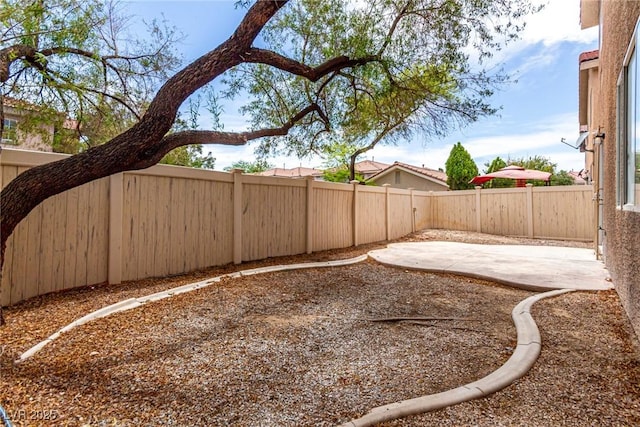 4705 Delicate Arch Ct, North Las Vegas, NV 89031 - fenced backyard featuring a patio area