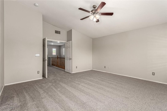 4705 Delicate Arch Ct, North Las Vegas, NV 89031 - carpeted spare room featuring ceiling fan, lofted ceiling, baseboards, and a smoke detector
