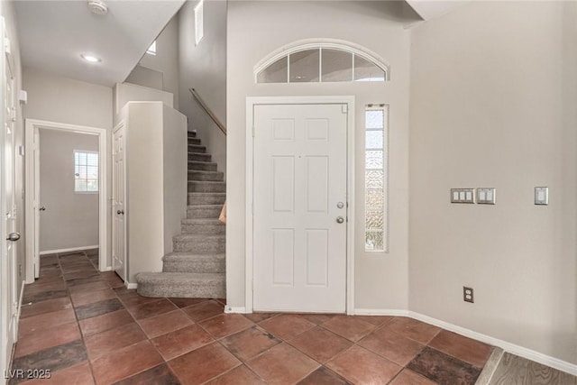 4705 Delicate Arch Ct, North Las Vegas, NV 89031 - foyer featuring stairway and baseboards