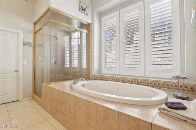 304 Cambrian Ridge Ct, Las Vegas, NV 89144 - bathroom with tile patterned floors, a garden tub, and a shower stall