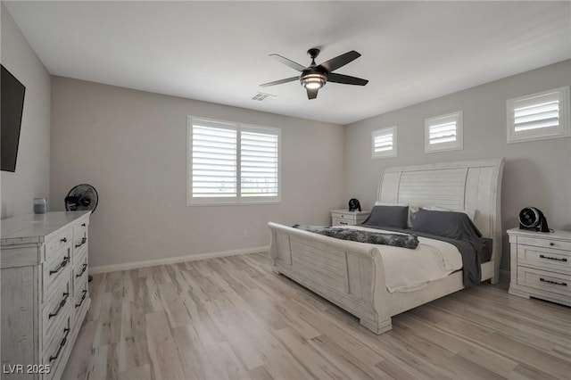 205 Piedmont Alps St, Henderson, NV 89012 - bedroom with light wood-style flooring, baseboards, and ceiling fan