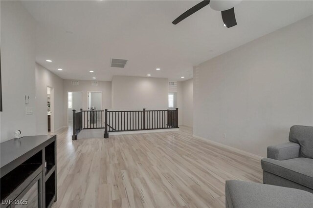 205 Piedmont Alps St, Henderson, NV 89012 - sitting room featuring an upstairs landing, recessed lighting, ceiling fan, light wood-style floors, and baseboards