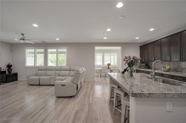 205 Piedmont Alps St, Henderson, NV 89012 - living room with recessed lighting, plenty of natural light, ceiling fan, and baseboards