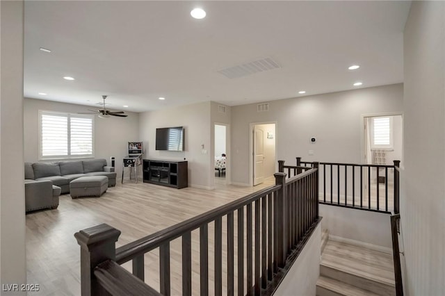 205 Piedmont Alps St, Henderson, NV 89012 - stairs featuring wood finished floors, healthy amount of natural light, recessed lighting, ceiling fan, and baseboards