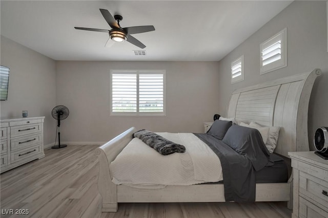205 Piedmont Alps St, Henderson, NV 89012 - bedroom with light wood-style floors, ceiling fan, and baseboards