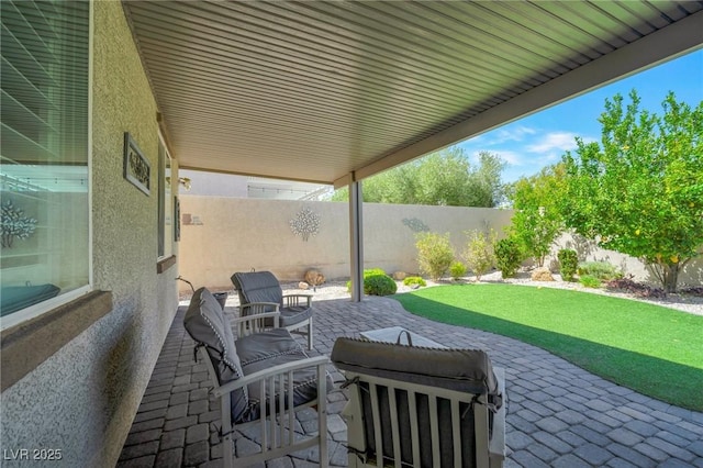 205 Piedmont Alps St, Henderson, NV 89012 - fenced backyard with a patio area