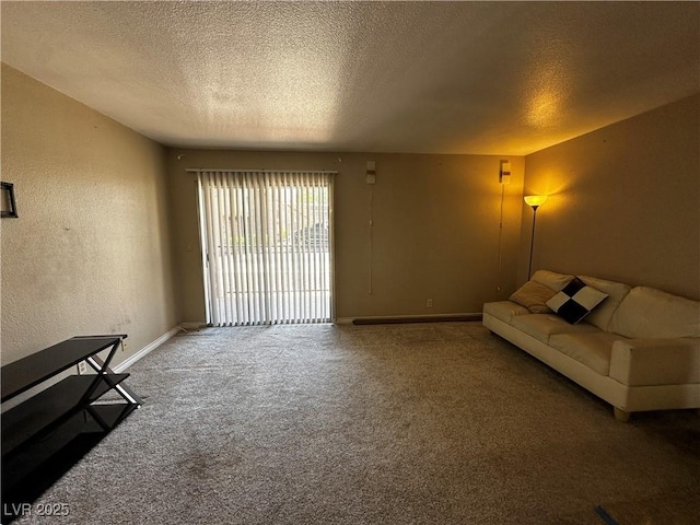 living room featuring carpet, a textured ceiling, baseboards, and a textured wall