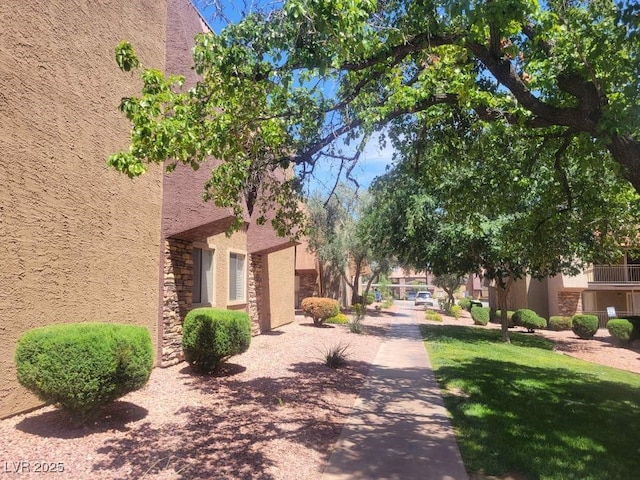 5188 River Glen Dr Unit 453, Las Vegas, NV 89103 - surrounding community featuring a lawn