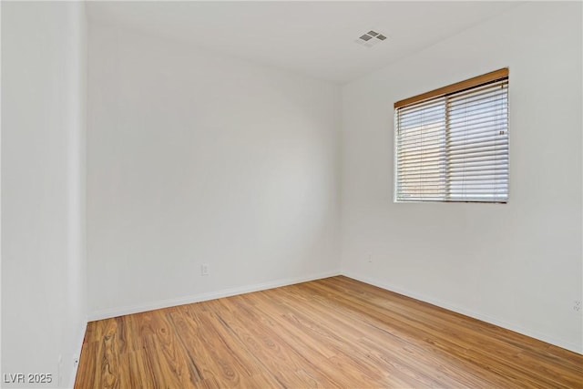 11247 Villa Trentino Ct, Las Vegas, NV 89141 - spare room with light wood-style flooring and baseboards