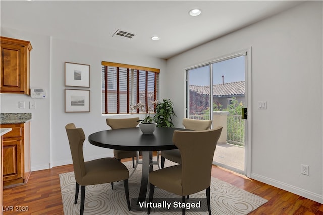 11247 Villa Trentino Ct, Las Vegas, NV 89141 - dining room featuring wood finished floors, baseboards, and recessed lighting