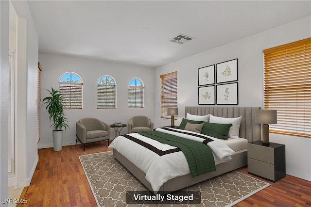 11247 Villa Trentino Ct, Las Vegas, NV 89141 - bedroom with wood finished floors and baseboards