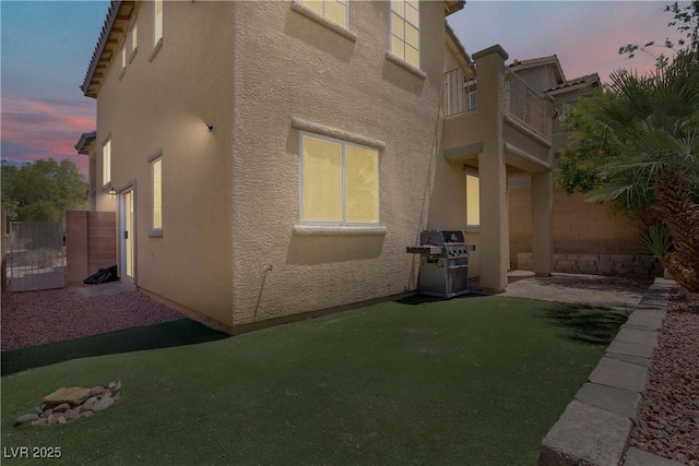 11247 Villa Trentino Ct, Las Vegas, NV 89141 - view of home's exterior featuring stucco siding and fence