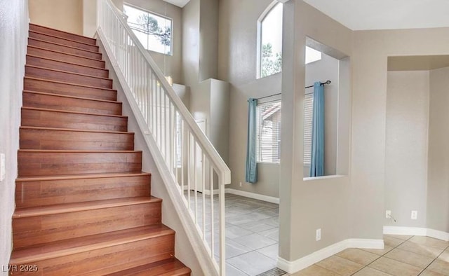 971 Whispering Grove Ave, Las Vegas, NV 89123 - stairway with tile patterned floors, healthy amount of natural light, and baseboards