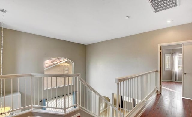 971 Whispering Grove Ave, Las Vegas, NV 89123 - hall featuring an upstairs landing, hardwood / wood-style floors, and baseboards