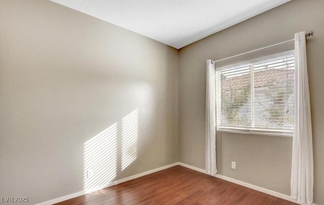 971 Whispering Grove Ave, Las Vegas, NV 89123 - spare room with wood finished floors and baseboards
