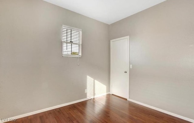 971 Whispering Grove Ave, Las Vegas, NV 89123 - spare room with baseboards and wood finished floors