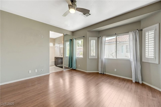 971 Whispering Grove Ave, Las Vegas, NV 89123 - unfurnished room featuring ceiling fan and wood finished floors