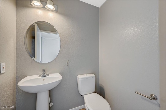 971 Whispering Grove Ave, Las Vegas, NV 89123 - half bath featuring toilet and a sink