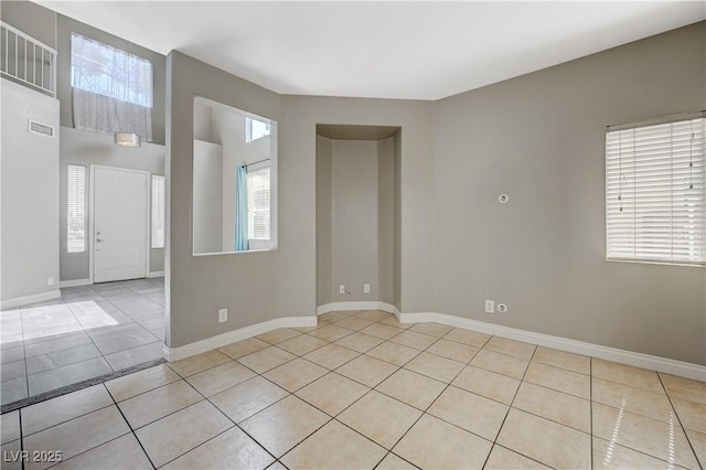971 Whispering Grove Ave, Las Vegas, NV 89123 - tiled empty room featuring baseboards