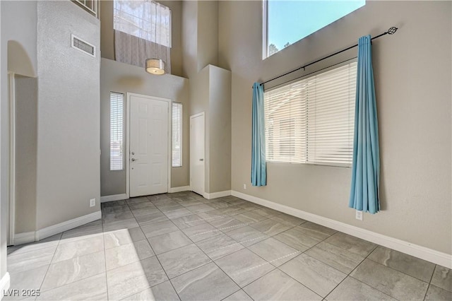 971 Whispering Grove Ave, Las Vegas, NV 89123 - entryway with baseboards and a high ceiling