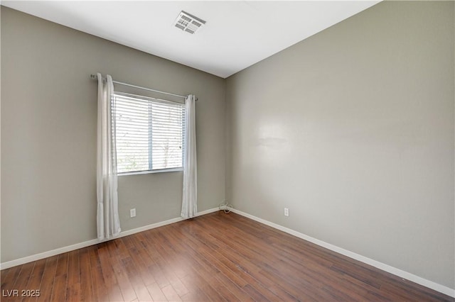 971 Whispering Grove Ave, Las Vegas, NV 89123 - spare room with baseboards and wood finished floors