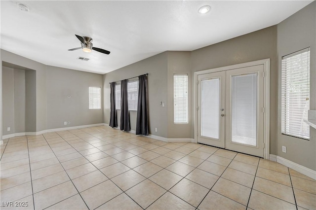 971 Whispering Grove Ave, Las Vegas, NV 89123 - spare room featuring french doors, a ceiling fan, a smoke detector, and light tile patterned floors