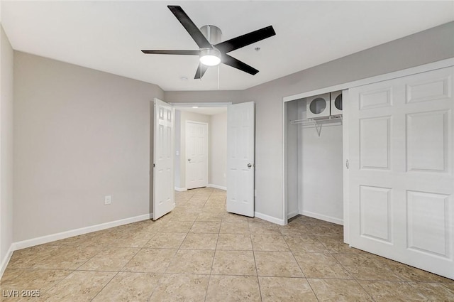 unfurnished bedroom with baseboards, a closet, ceiling fan, and light tile patterned floors