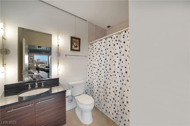 900 Las Vegas Blvd Unit 715, Las Vegas, NV 89101 - bathroom with connected bathroom, toilet, vanity, and a shower with curtain