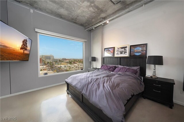 900 Las Vegas Blvd Unit 715, Las Vegas, NV 89101 - bedroom with baseboards and concrete flooring