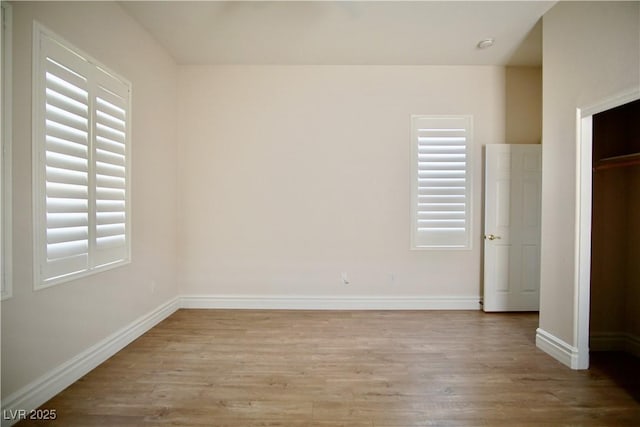 66 Sunset Bay St, Las Vegas, NV 89148 - unfurnished bedroom with wood finished floors and baseboards
