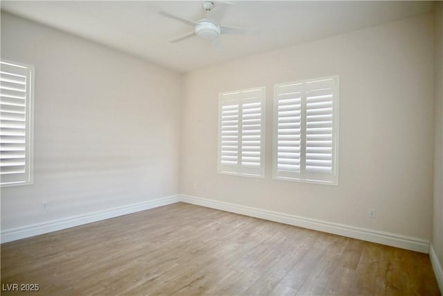 66 Sunset Bay St, Las Vegas, NV 89148 - unfurnished room with wood finished floors, baseboards, and ceiling fan
