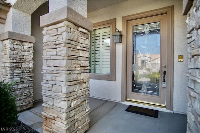 66 Sunset Bay St, Las Vegas, NV 89148 - property entrance with stucco siding and stone siding