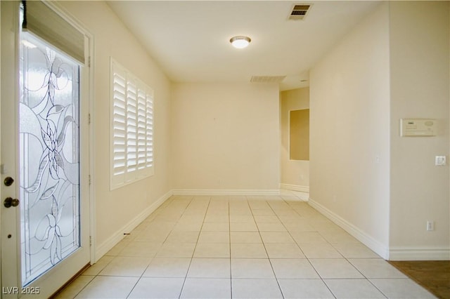 66 Sunset Bay St, Las Vegas, NV 89148 - foyer featuring plenty of natural light, light tile patterned floors, and baseboards