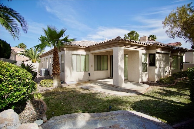 66 Sunset Bay St, Las Vegas, NV 89148 - rear view of property featuring stucco siding, central AC unit, a patio, and a tile roof