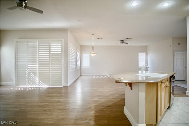 66 Sunset Bay St, Las Vegas, NV 89148 - kitchen featuring a sink, a ceiling fan, open floor plan, healthy amount of natural light, and recessed lighting