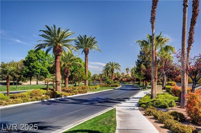66 Sunset Bay St, Las Vegas, NV 89148 - view of asphalt road featuring curbs and sidewalks