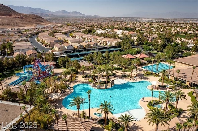 66 Sunset Bay St, Las Vegas, NV 89148 - view of pool featuring a mountain view and a residential view