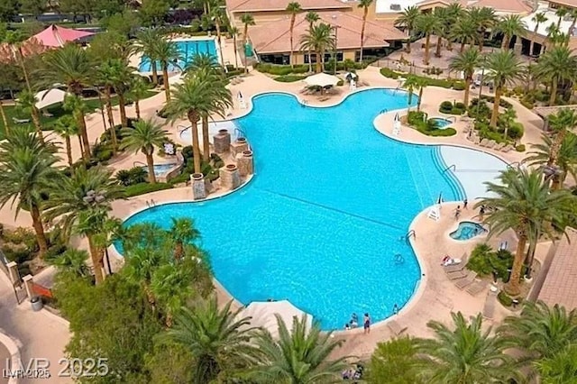 66 Sunset Bay St, Las Vegas, NV 89148 - community pool with a patio